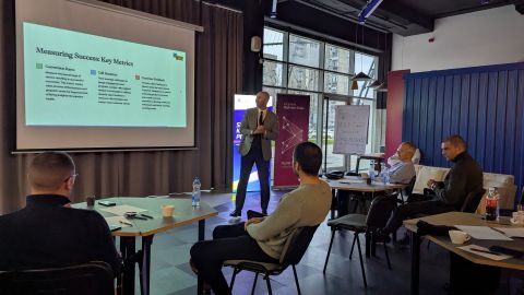 Patrick Collins presenting on measuring success and key metrics